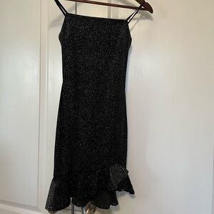 Elegant Black Dress with Ruffle Hem